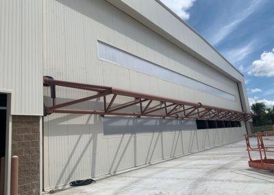 Hangar, Michigan BUilder, Construction Manager, Quadrants Development, Construction Management, Design Build, General Contractor, Construction Services, Pre-Engineered Metal Building Systems, Remodeling, Renovations, light industrial, pre-construction, construction, airport construction,